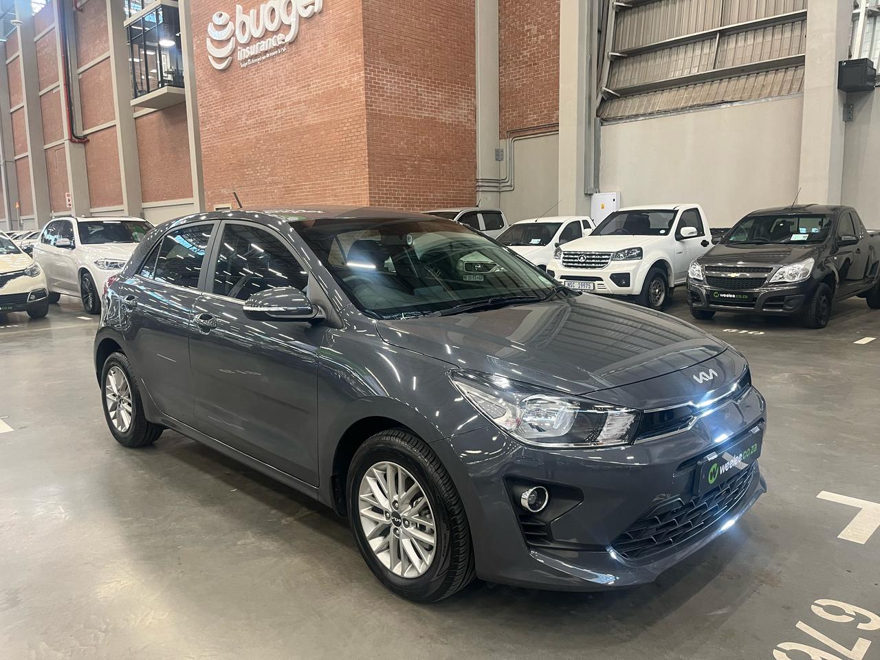 2023 Kia Rio VI 1.4 LX 5 Door Auto Q2FyTGlzdGluZzo0NDc1MDA R309900